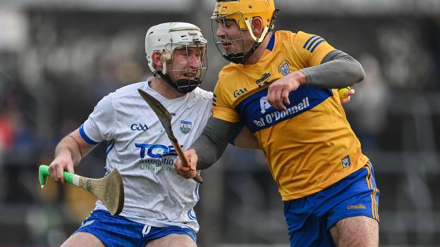 Shane McNulty of Waterford is tackled by Mark Rodgers of Clare during the Co-Op Superstores Munster Hurling League Group 1 match between Clare and Waterford at Cusack Park in Ennis, Clare. 