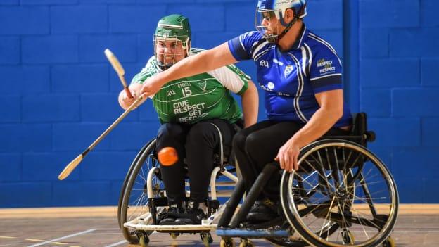 John Scott of Leinster in action against James McCarthy of Munster during the M.Donnelly GAA Wheelchair Hurling All-Ireland Finals match between Munster and Leinster at the Sport Ireland National Indoor Arena in Abbotstown, Dublin. 