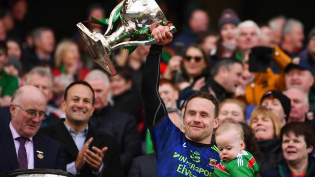 Andy Moran lifts the Cup with his son Ollie after Mayo's victory over Kerry in the Allianz Football League Division 1 Final. 