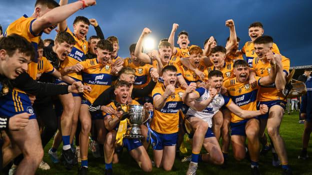 Clare players celebrate with the trophy after their side's victory in the 2023 Electric Ireland Munster GAA Hurling Minor Championship Final match between Cork and Clare at FBD Semple Stadium in Thurles, Tipperary. Photo by Harry Murphy/Sportsfile