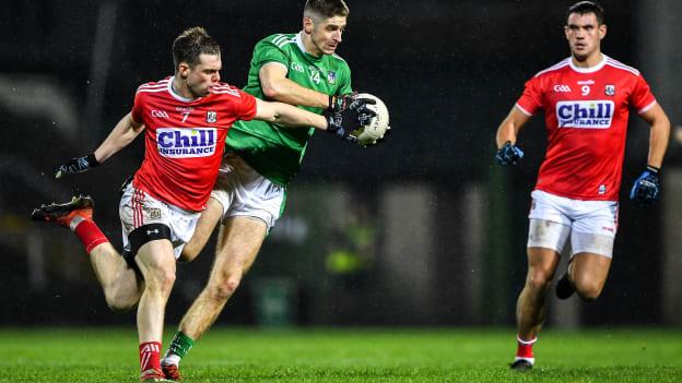 Danny Neville of Limerick in action against Cian Kiely, left, and Thomas Clancy of Cork during the McGrath Cup Final match between Cork and Limerick at LIT Gaelic Grounds in Limerick.