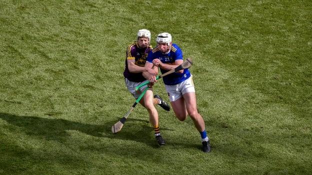 Seamus Kennedy of Tipperary in action against David Dunne of Wexford during the GAA Hurling All-Ireland Senior Championship semi-final match between Wexford and Tipperary at Croke Park in Dublin. 