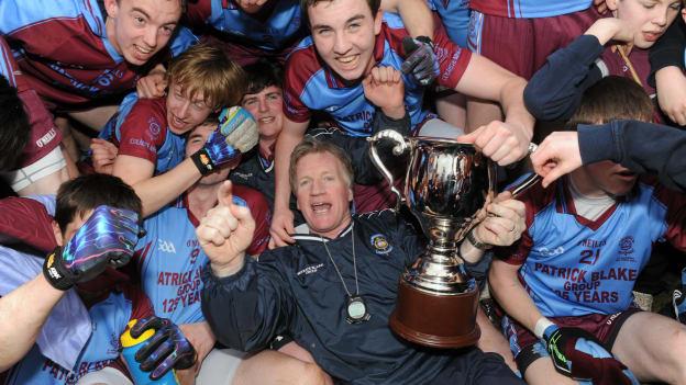 St. Michael's, Enniskillen manager, Dom Corrigan, and his players celebrate after their 2012 MacRory Cup success. 