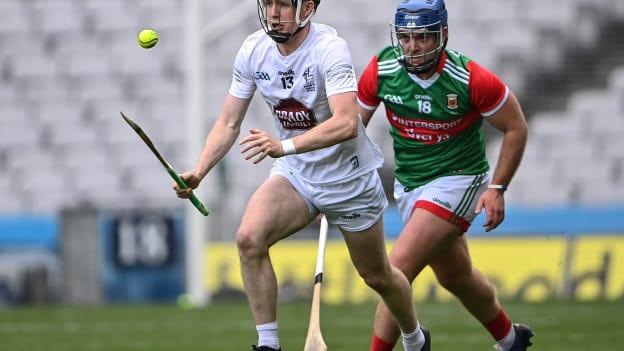 Kildare captain Brian Byrne looks to evade the challenge of Mayo's Kenny Feeney in Saturday's Christy Ring Cup final. 