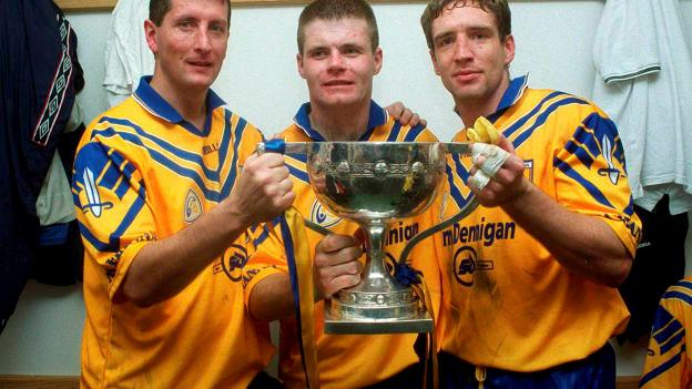 Na Fianna players (l to r) Mick Galvin, Dessie Farrell and Kieran McGeeney lift the cup after victory over Kilmacud Crokes in the 2000 Dublin Senior Football Final. 