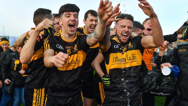 Dr. Crokes players, Tony Brosnan, left, and Micheál Burns celebrate after victory over Dingle in the Kerry SFC Final. 