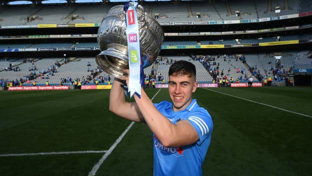 Lorcan O'Dell of Dublin celebrates with the Delaney Cup after the Leinster GAA Football Senior Championship Final match between Dublin and Kildare at Croke Park in Dublin.