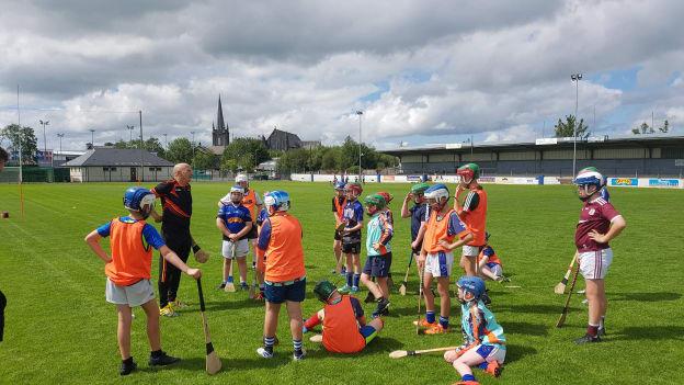 GAA National Hurling Development Manager, Martin Fogarty, pictured with Claremorris hurlers at their 2020 Kelloggs Cúl Camp.