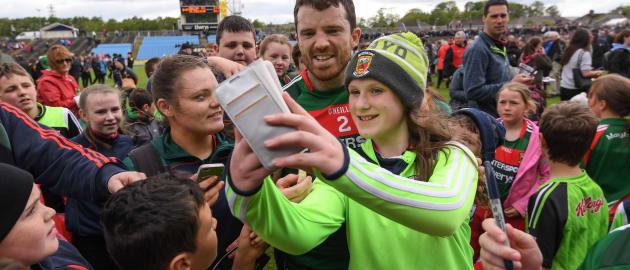 Chris Barrett with Mayo supporters following the game at Elverys MacHale Park.
