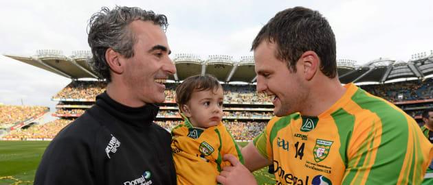 Donegal manager Jim McGuinness and his 18 month old son Jimmy celebrate with Donegal captain Michael Murphy after 2012 All-Ireland SFC Final victory over Mayo.