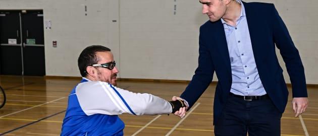 Minister of State for Sport and the Gaeltacht, Jack Chambers TD meeting James McCarthy of Munster before the M.Donnelly GAA Wheelchair Hurling / Camogie All-Ireland Finals 2022 at Ashbourne Community School in Ashbourne, Meath. 