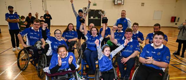 Munster players and supporters celebrate with the cup after the M.Donnelly GAA Wheelchair Hurling / Camogie All-Ireland Finals 2022 at Ashbourne Community School in Ashbourne, Meath. 
