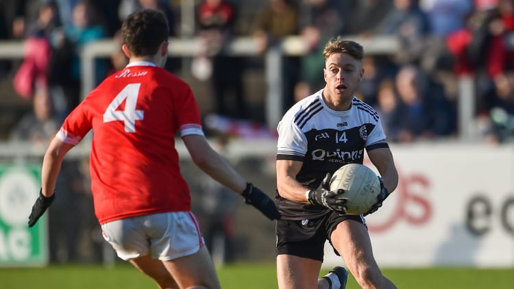 Jerome Johnston on the ball for Kilcoo during the 2019 AIB Ulster Club Senior Football Championship.