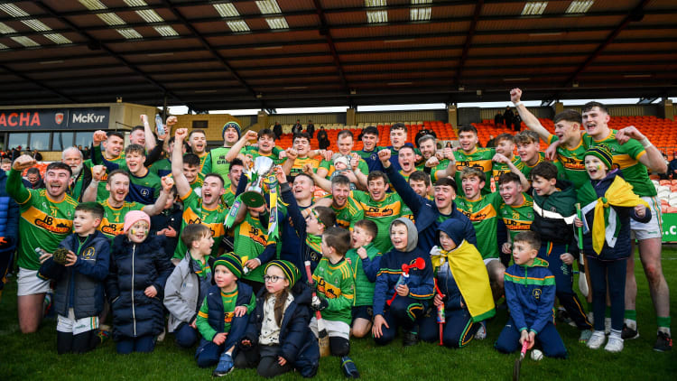 Dunloy players and supporters celebrate at the Athletic Grounds.