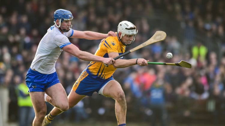 Aron Shanagher, Clare, and Conor Prunty, Waterford, in Co-op Superstores Munster Hurling League action at Fraher Field.