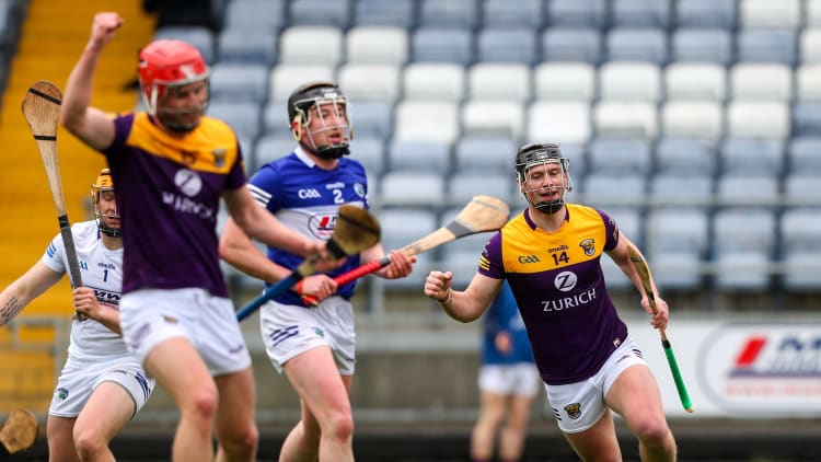 Conor McDonald of Wexford right, celebrates after scoring his side's first goal during the Leinster GAA Hurling Senior Championship Round 3 match between Laois and Wexford at MW Hire O’Moore Park in Portlaoise, Laois.