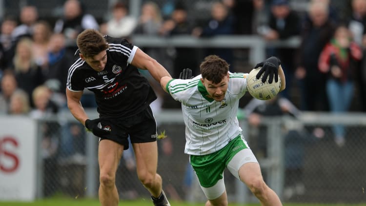 Donal O'Hare, Burren, and Aaron Branagan, Kilcoo, during the 2017 Down SFC Final.