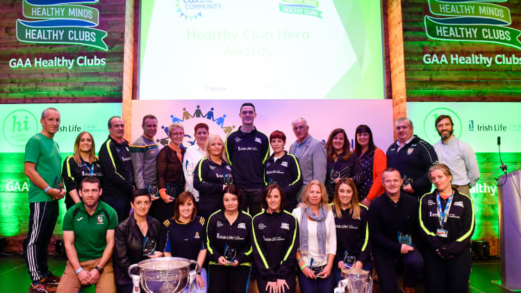 Dublin and Raheny footballer Brian Fenton, centre, with 'Hero Award' winners during the 2018 GAA National Healthy Club Conference at Croke Park Stadium, in Dublin.