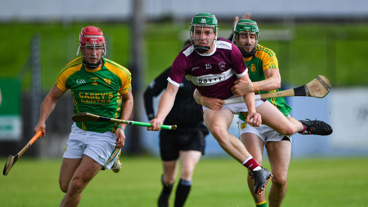 James Devaney of Borris-Ileigh in action against Joey McLoughney and Jake Ryan, left, of Toomevara during the Tipperary County Senior Hurling Championship Group 4 Round 1 match between Toomevara and Borris-Ileigh at McDonagh Park in Nenagh, Tipperary.