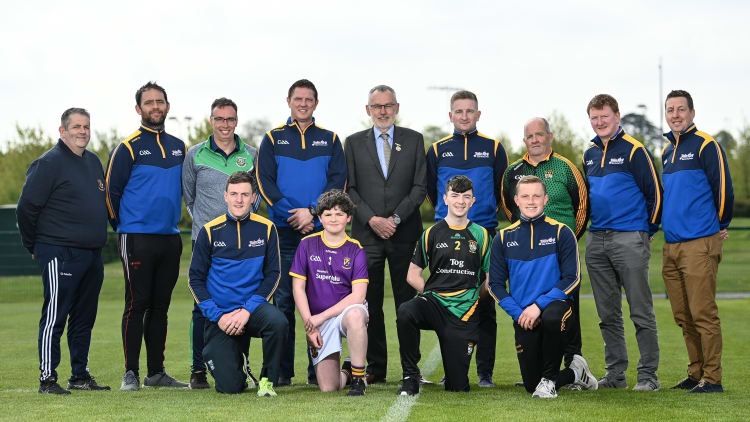 Connacht hurling director Damien Coleman (fourth from left, back row) and Ulster hurling director Kevin Kelly (second from right, back row) have seen the benefits of the Electric Ireland Celtic Challenge competition.