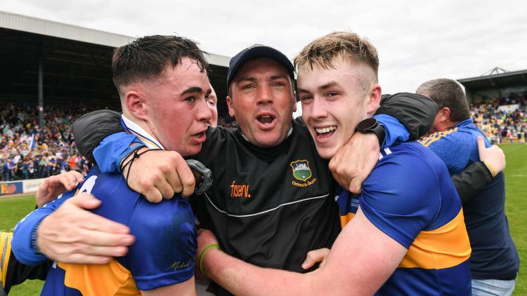 Tipperary manager James Woodlock celebrates with Adam Daly, left, and Tadhg Sheehan after the Electric Ireland GAA Hurling All-Ireland Minor Championship Final match between Tipperary and Offaly at UPMC Nowlan Park, Kilkenny.