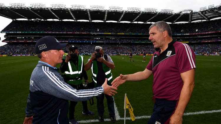 Galway manager Kevin Walsh (r) congratulates Dublin manager Jim Gavin after the All-Ireland SFC semi-final.