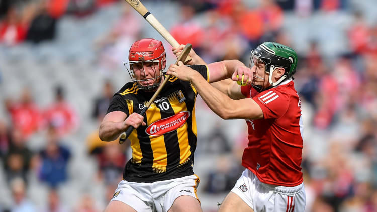 Adrian Mullen of Kilkenny is tackled by Mark Coleman of Cork during the 2021 GAA Hurling All-Ireland Senior Championship semi-final match between Kilkenny and Cork at Croke Park in Dublin.