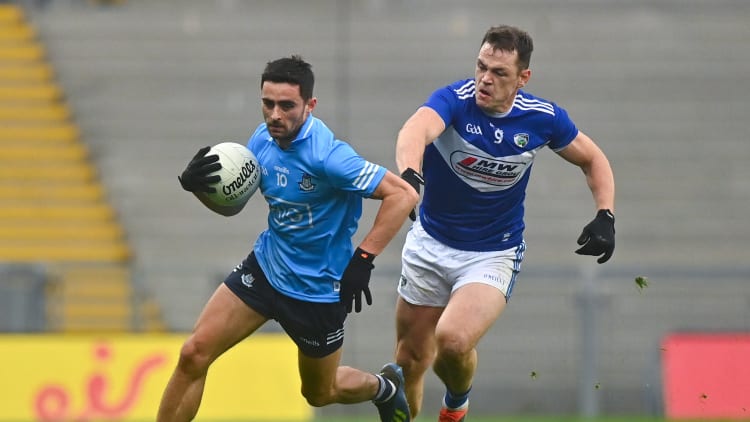 Niall Scully, Dublin, and John O'Loughlin, Laois, during the Leinster SFC semi-final at Croke Park.