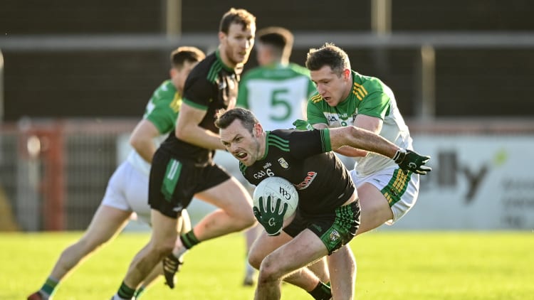 James Laverty, Erin's Own, Cargin, and Emmett Bradley, Glen, in AIB Ulster Club SFC action.