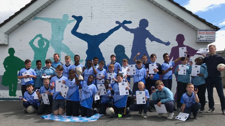 Pupils of St Michael's Boys National School in Longford celebrate with their recently won Cumann na mBunscol medals.