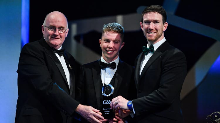 Sligo hurler James Weir is presented with his Champion 15 award by Uachtarán Cumann Lúthchleas Gael John Horan, left, and GPA Chairman Seamus Hickey during the PwC All-Stars 2019 at the Convention Centre in Dublin.