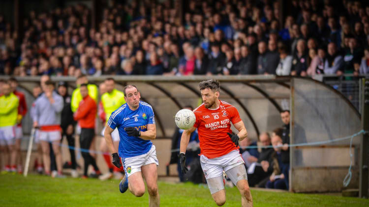 Trillick's Mattie Donnelly in action against Coalisland in the Tyrone SFC semi-final. (Picture courtesy of TeamTalkMag)