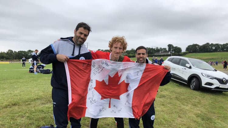 Jonny Lajeunesse with two Argentinean players at the 2019 GAA World GAmes in Waterford.