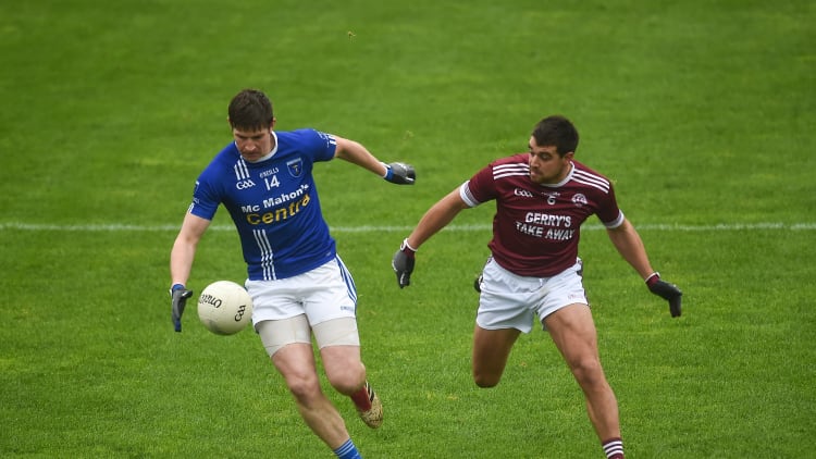 Darren Hughes of Scotstown in action against Drew Wylie of Ballybay during the Monaghan County Senior Club Football Championship Final.