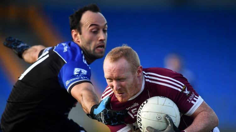 Cian Mackey, St Columba's Mullinalaghta, and Anthony McLoughlin, Blessington, during the AIB Leinster GAA Football Senior Club Championship first round encounter at Glennon Brothers Pearse Park.