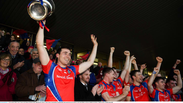 Conor Cooney of St Thomas' lifts the trophy following the Galway County Senior Club Hurling Championship Final between St Thomas' and Liam Mellows at Pearse Stadium.