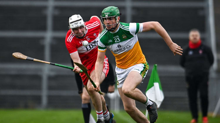 Brian Duignan, Offaly, and Conor Kelly, Derry, in Christy Ring Cup action on Saturday.