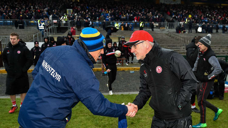 Anthony Cunningham and Mickey Harte shake hands following an Allianz Football League Division One draw in February.