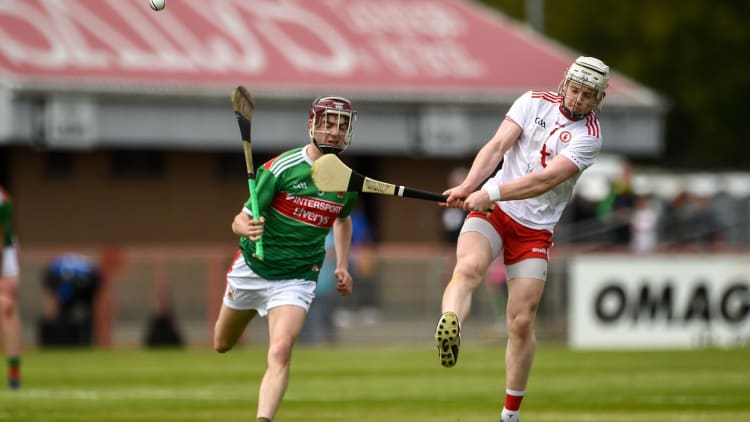 Sean Donaghy, Tyrone, and Sean Kenny, Mayo, in Nicky Rackard Cup action.