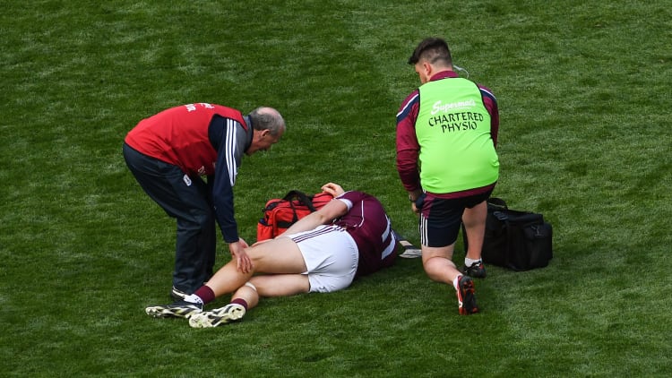 Joe Canning of Galway is treated for an injury during the GAA Hurling All-Ireland Senior Championship semi-final match between Galway and Clare at Croke Park.