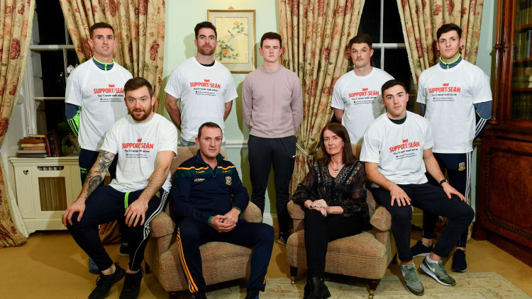 Meath and Dublin will contest the Sean Cox fundraiser challenge match on Sunday. Sean Cox's wife, Martina, and son, Jack, are pictured here with Andy McEntee and footballers from Dublin and Meath ahead of Sunday's game at Pairc Tailteann.
