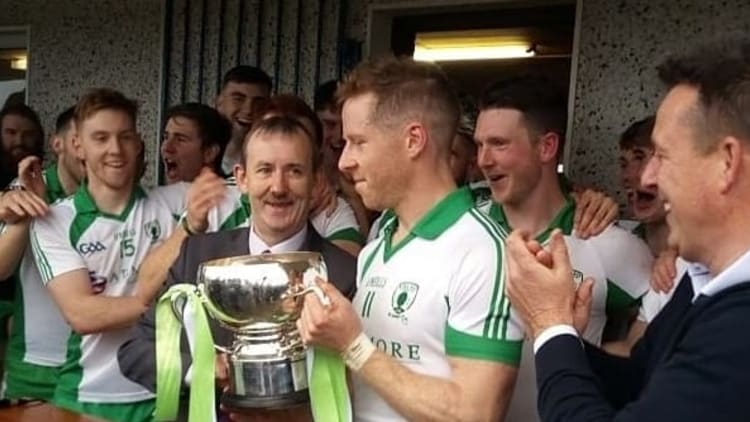 Sean McCormack accepts the cup for Killoe after victory over Longford Slashers in the Longford SFC Final.