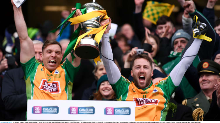 Ciaran McGrath and Micheal Lundy lift the Andy Merrigan Cup at Croke Park.