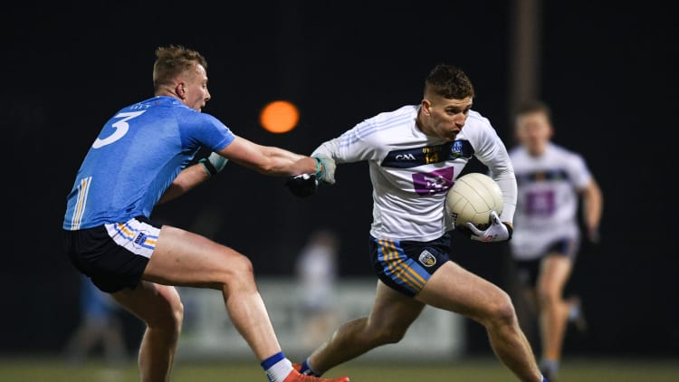 Evan O'Carroll of University College Dublin in action against Brian Power of TU Dublin City Campus during the Electric Ireland Sigerson Cup Round 3 match between UCD and TUDCC at Billings Park in UCD, Dublin.