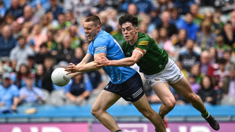 Con O’Callaghan of Dublin is fouled by Eoin Harkin of Meath, resulting in a penalty, during the Leinster GAA Football Senior Championship Semi-Final match between Dublin and Meath at Croke Park in Dublin.