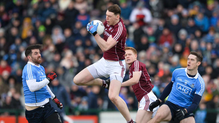 Tom Flynn makes a good catch during a lively encounter at Pearse Stadium on Sunday.
