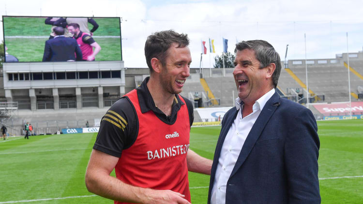 Offaly manager Michael Fennelly is congratulated by Offaly GAA chairman Michael Duignan after the Christy Ring Cup Final match between Derry and Offaly at Croke Park in Dublin.