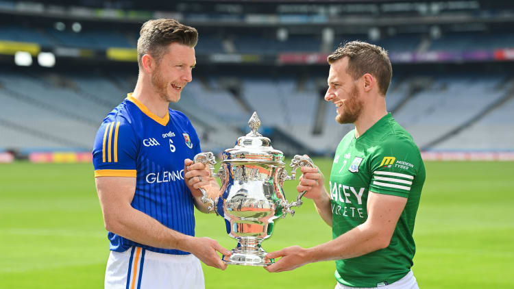 Mickey Quinn, Longford, and Declan McCusker, Fermanagh, pictured with the Tailteann Cup at Croke Park.