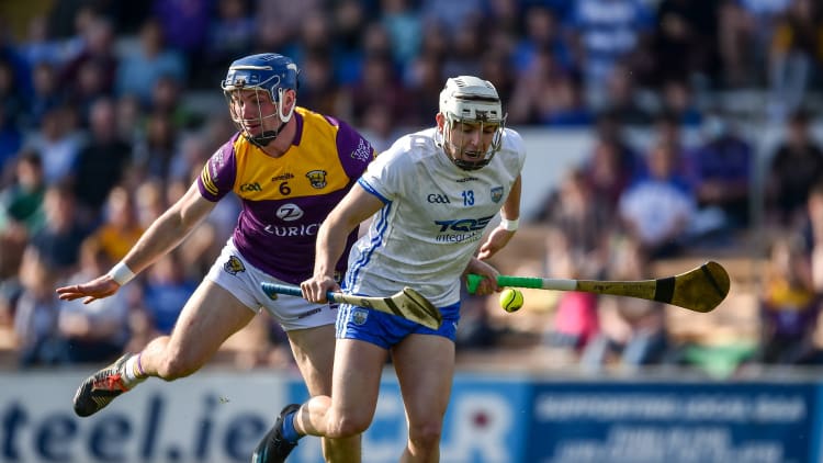Dessie Hutchinson, Waterford, and Kevin Foley, Wexford, during Sunday's Allianz Hurling League semi-final at UPMC Nowlan Park.