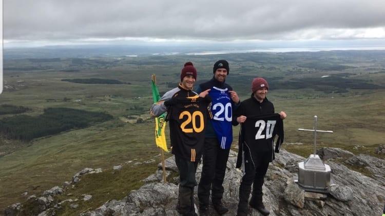 (l to r) Aaron Kyles Kevin McBrearty and James McGroary pictured after scaling Carnaween Mountain for the 20th time in 48 hours.